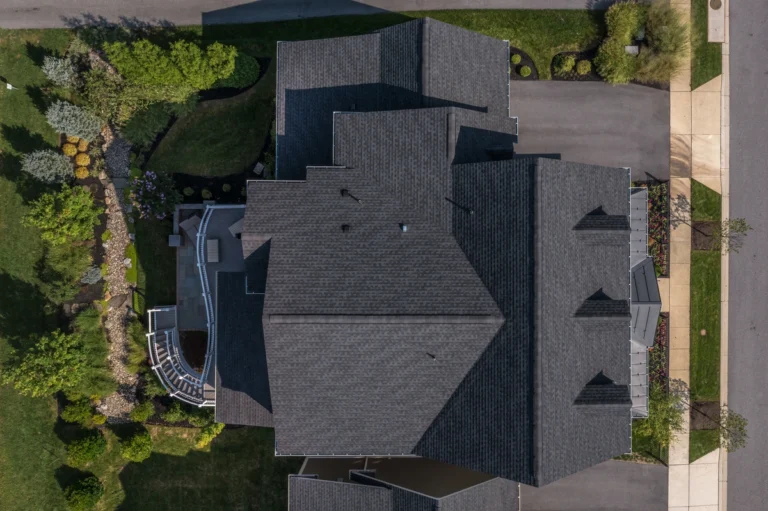arial drone view of shingle caps along roof peaks