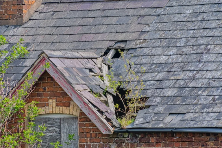slate-roof-repair-on-old-house
