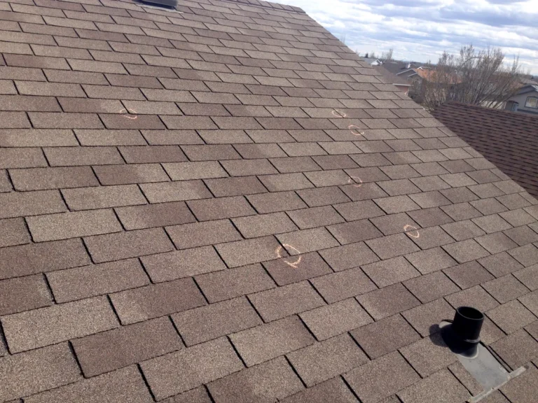 signs of hail damage on a roof
