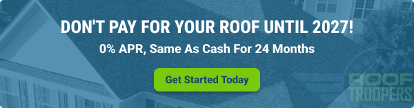 Banner ad with aerial view of rooftops, text reads: "DON'T PAY FOR YOUR ROOF UNTIL 2027! 0% APR, Same As Cash For 24 Months." Green button says "Get Started Today." Roof Troopers logo in corner.