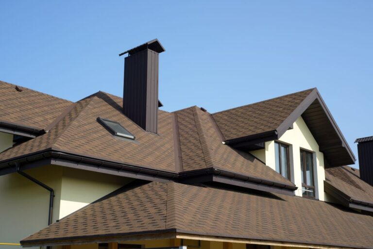 brown shingle roof on a newly built house