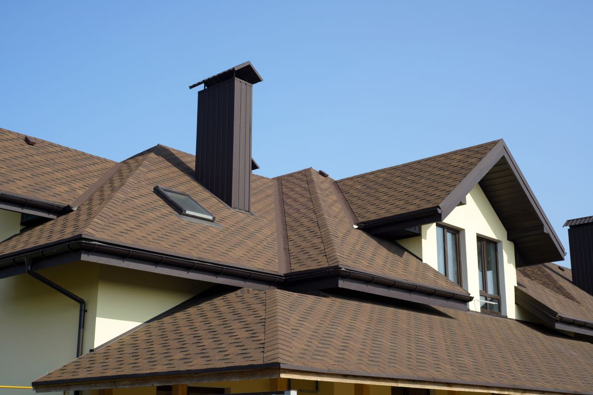 brown shingle roof on a newly built house
