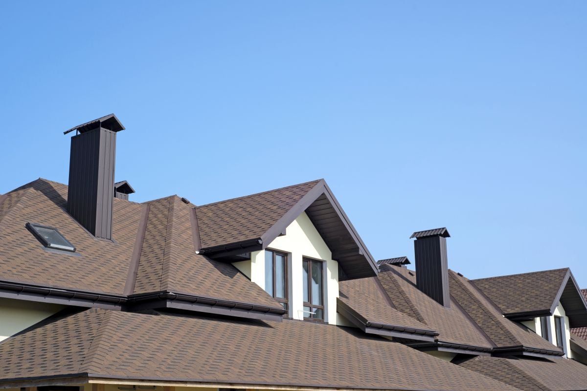 house roof with brown asphalt shingles