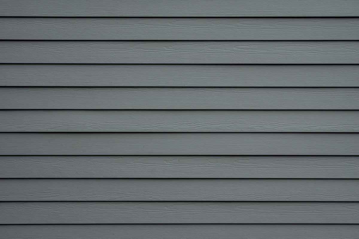 Gray horizontal siding panels.